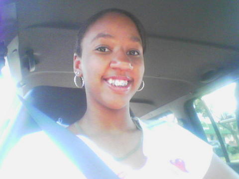 me chilling in the car on my way to da mall