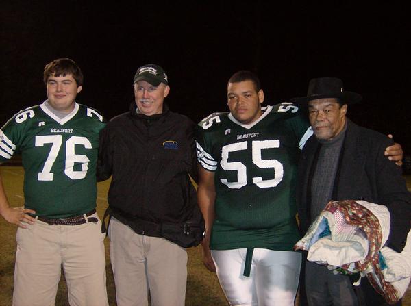 Senior football players night with family