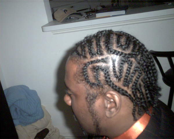 Me looking  left in da braids in 04