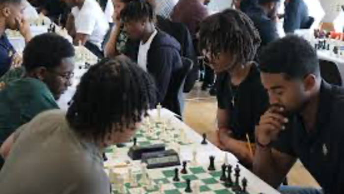 I learned the game of Chess while manning the RA desk in RUSH hall @ where did you play your first CHESS GAME