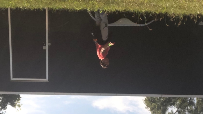 Who can do a handstand while wrangling two Athletic Trainers aka Dog