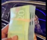 Drake hands out wads of cash to Toronto fans on Christmas